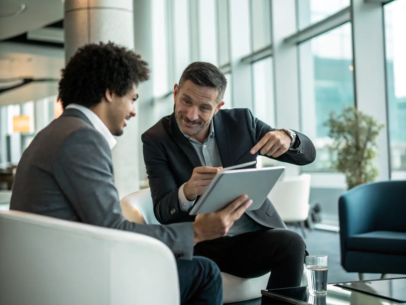 An IT consultant advising a business team, emphasizing the importance of strategic IT planning for operational efficiency and growth.